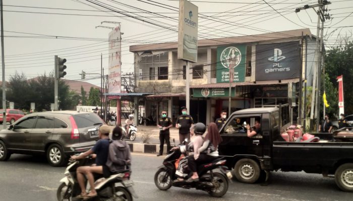 Kondisi Udara Terdampak Kabut Asap, BPWU, IPSI dan PWK Bagikan 1.500 Masker kepada Pengendara